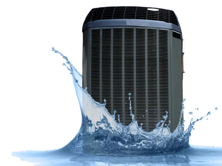 An AC unit sits atop a splash of water